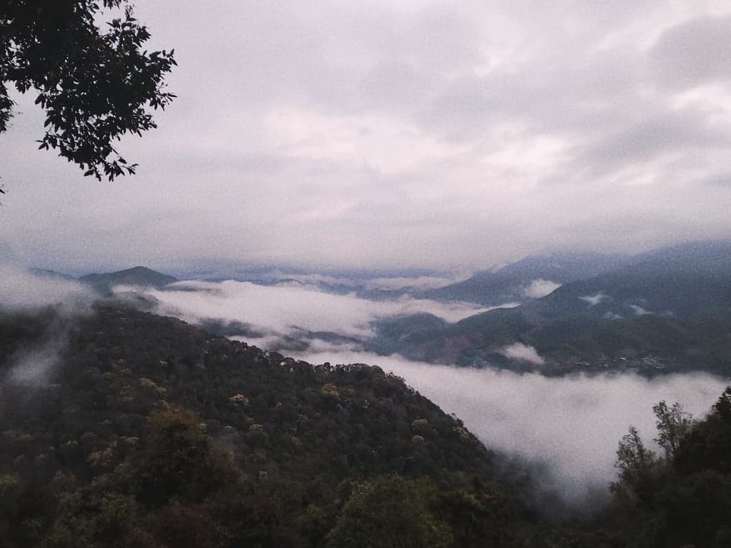 A view of a sea of mist over Sapan village, Bo Kleau, Nan from a high mountain.